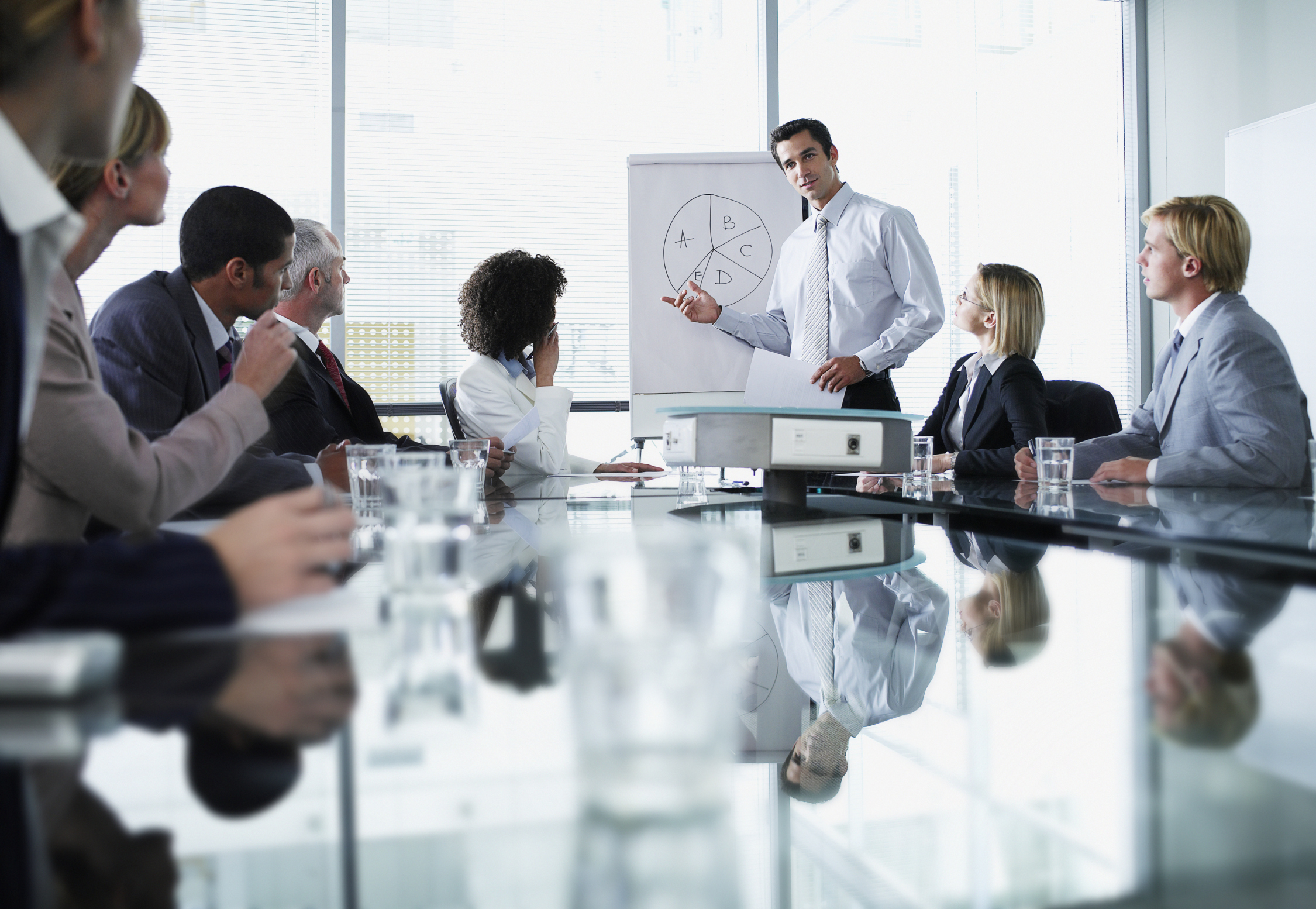 high resolution close up of a trainer conducting a financial
